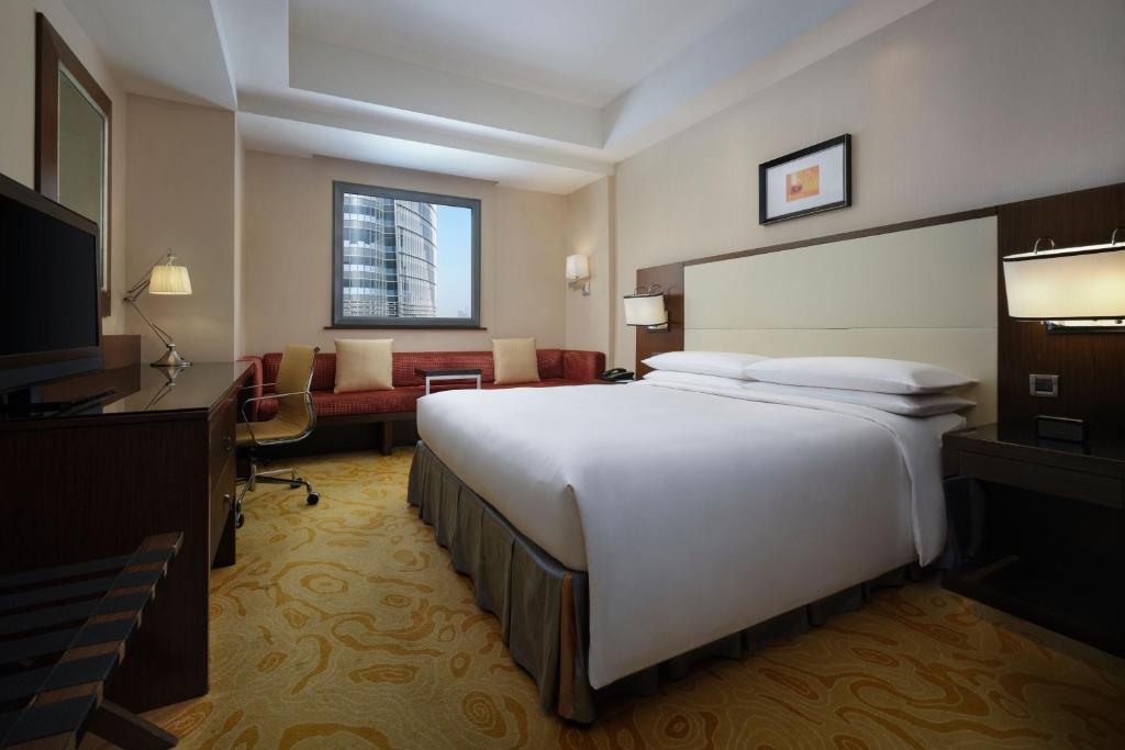 TV a/nebo společenská místnost v ubytování Courtyard By Marriott Shanghai Xujiahui