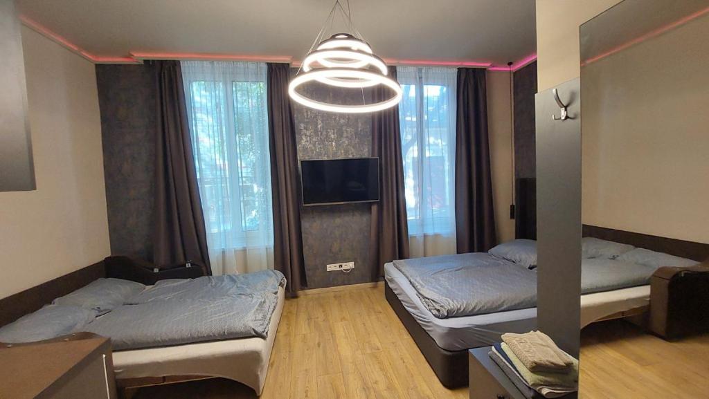 Postel nebo postele na pokoji v ubytování Földváry 3in1 Apartments