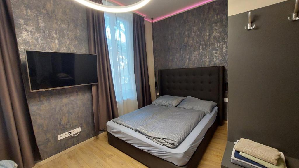 Postel nebo postele na pokoji v ubytování Földváry 3in1 Apartments