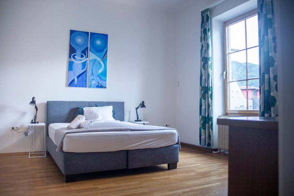 Postel nebo postele na pokoji v ubytování Trend Lokal-Rooms-Bar