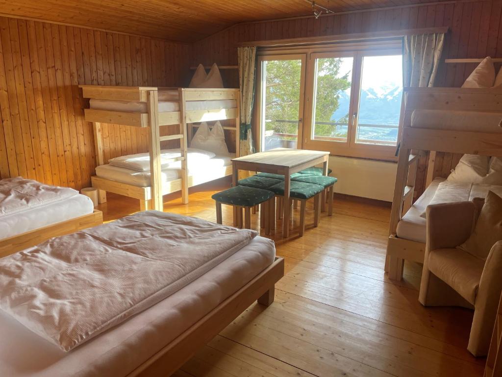 Postel nebo postele na pokoji v ubytování Berggasthaus Matu