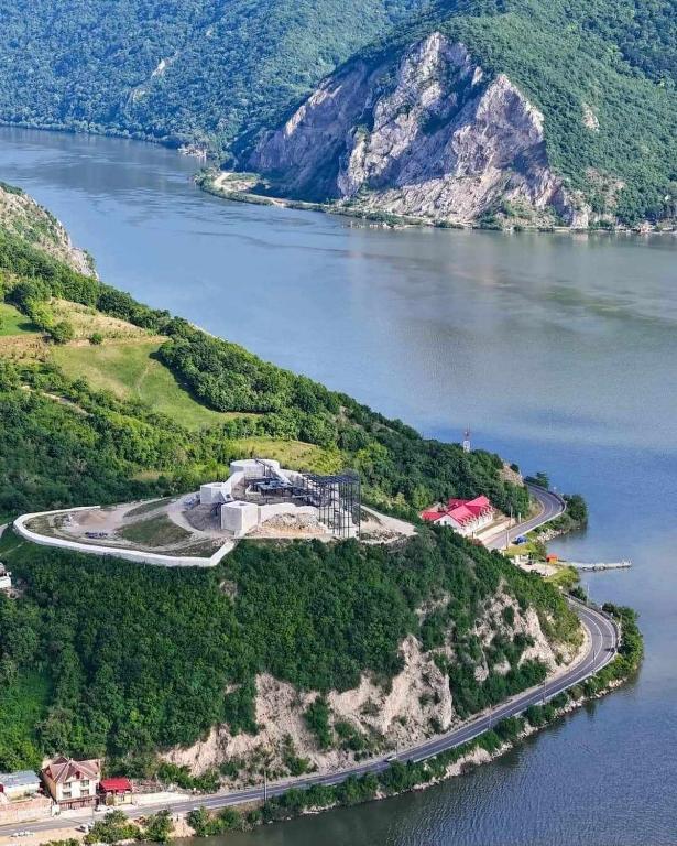 an island in the middle of a body of water at Casa Ștefania in Pescari