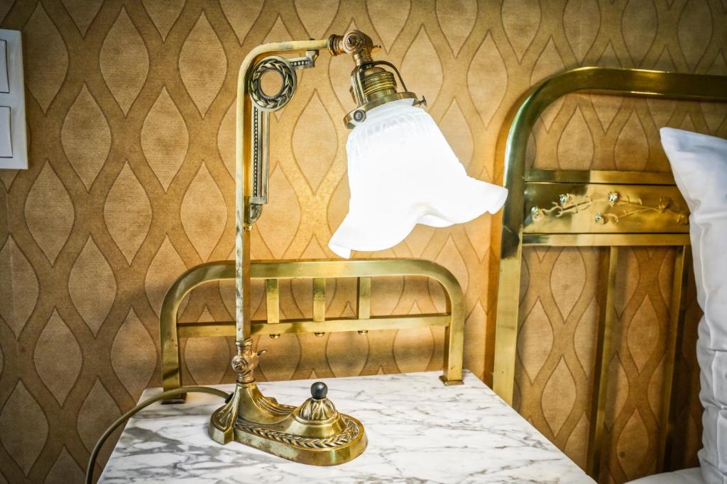 Postel nebo postele na pokoji v ubytování Penta Apartments