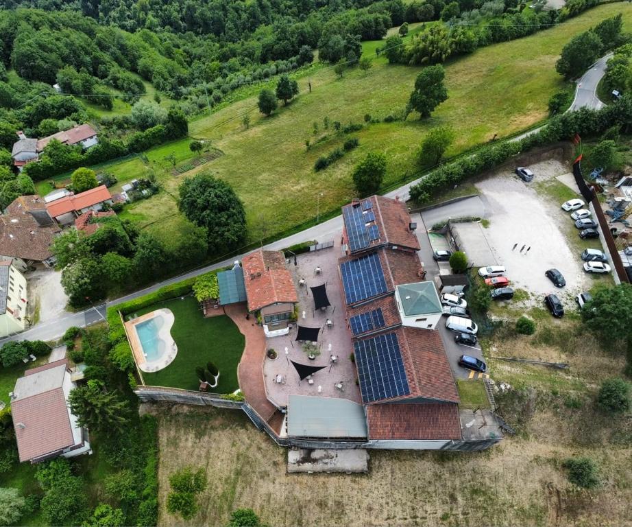 an aerial view of a house with solar panels on it at Albergo Torre in Vicenza