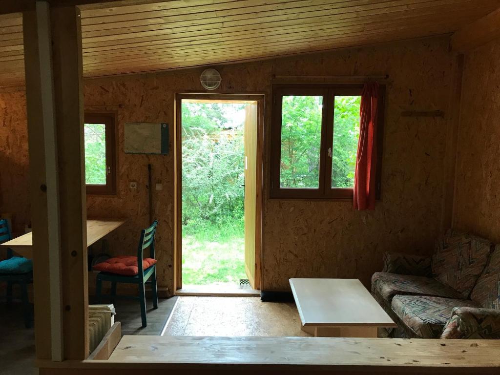 Posezení v ubytování sous les arbres