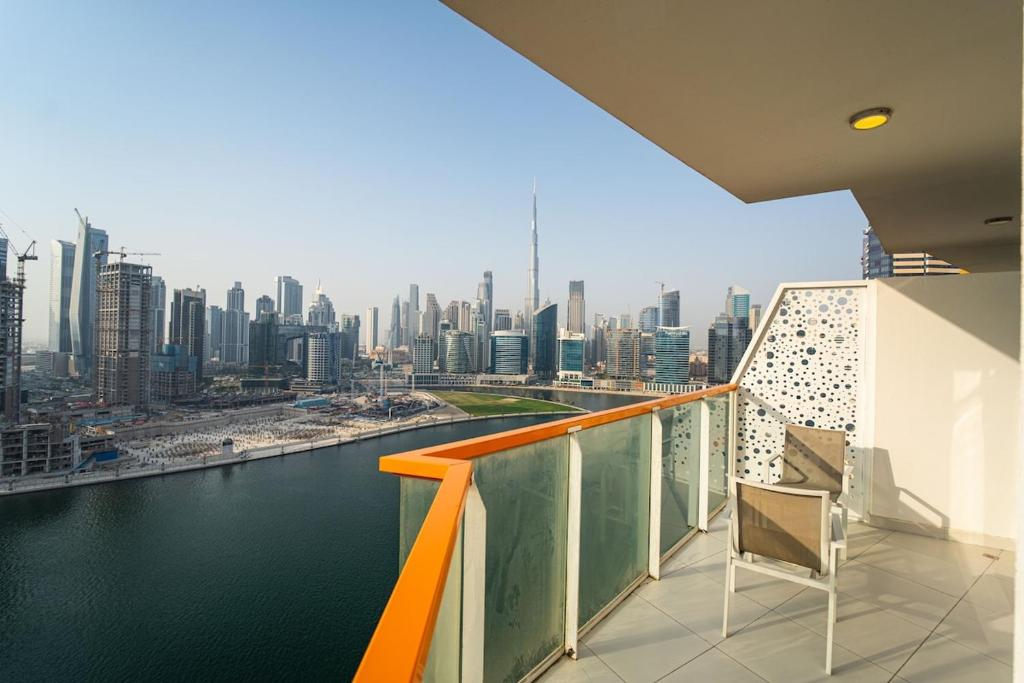 a balcony with a view of the city at AWS Homes - Luxurious 2BR in Business Bay in Dubai