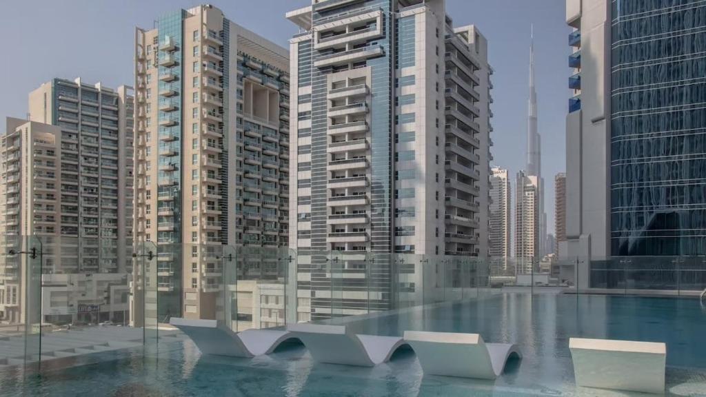 a view of a city with tall buildings at AWS Homes - Supreme Retreat in Business Bay in Dubai