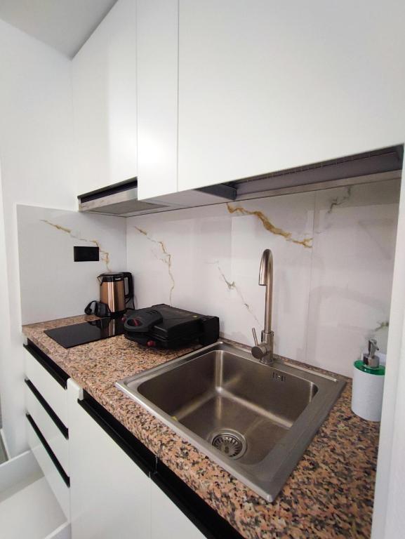 Kuchyň nebo kuchyňský kout v ubytování Comfort Villa