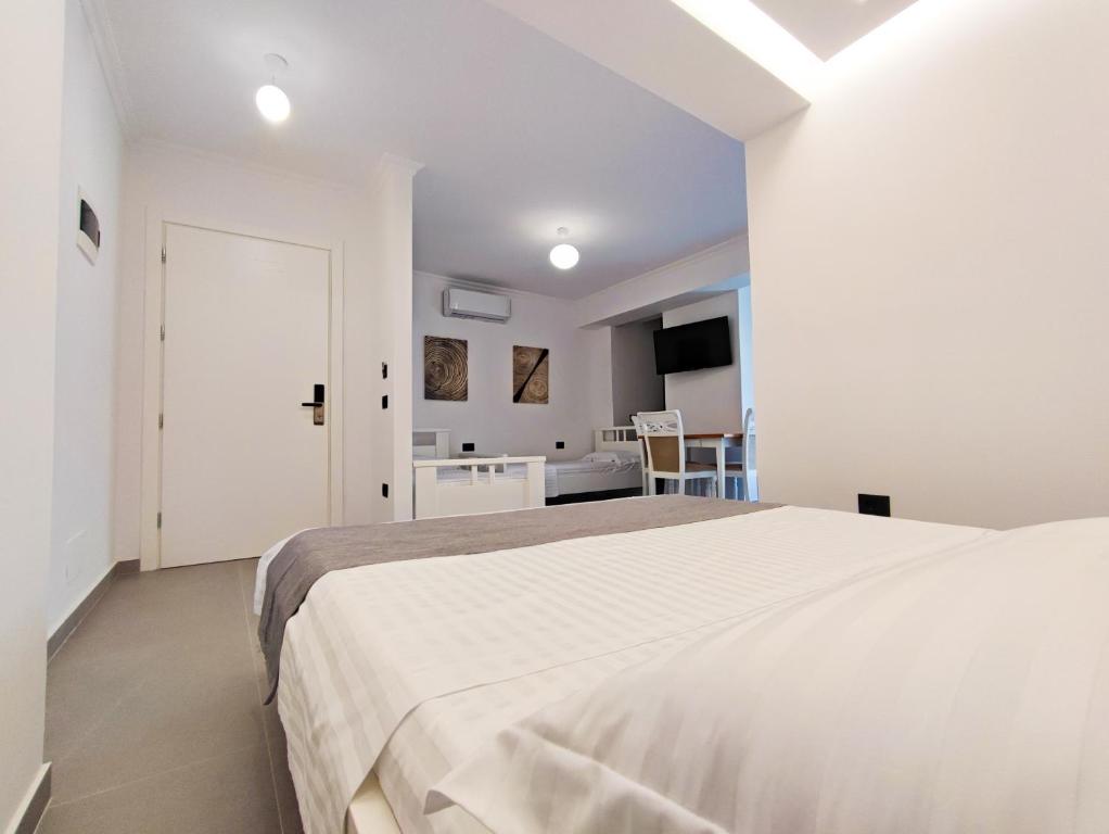 Postel nebo postele na pokoji v ubytování Comfort Villa