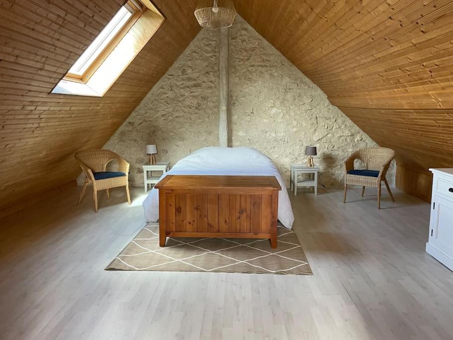 Postel nebo postele na pokoji v ubytování Gîte le village des champs
