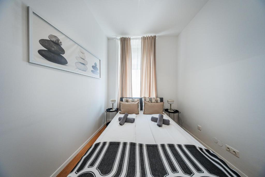 Postel nebo postele na pokoji v ubytování Nice Central City Room