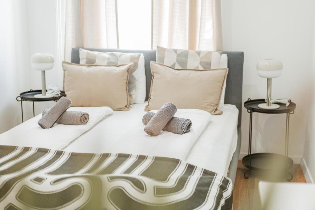Postel nebo postele na pokoji v ubytování Nice Central City Room