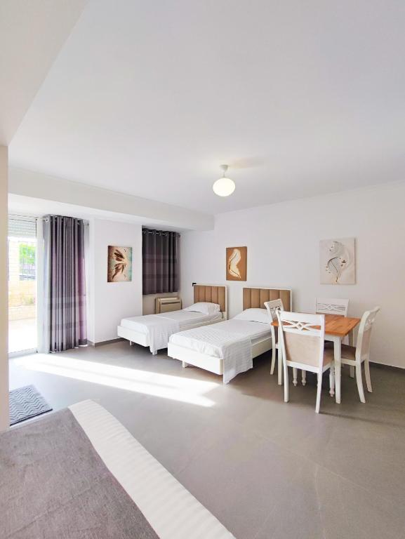 Postel nebo postele na pokoji v ubytování Comfort Villa