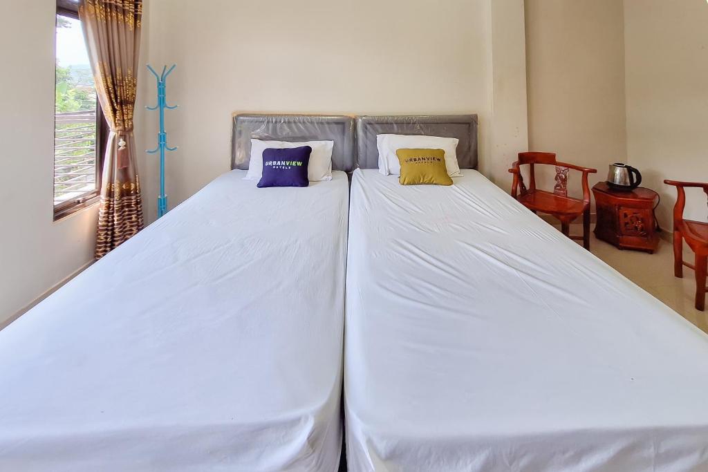 Urbanview Hotel Penginapan Ananda - Standaard Tweepersoonskamer
