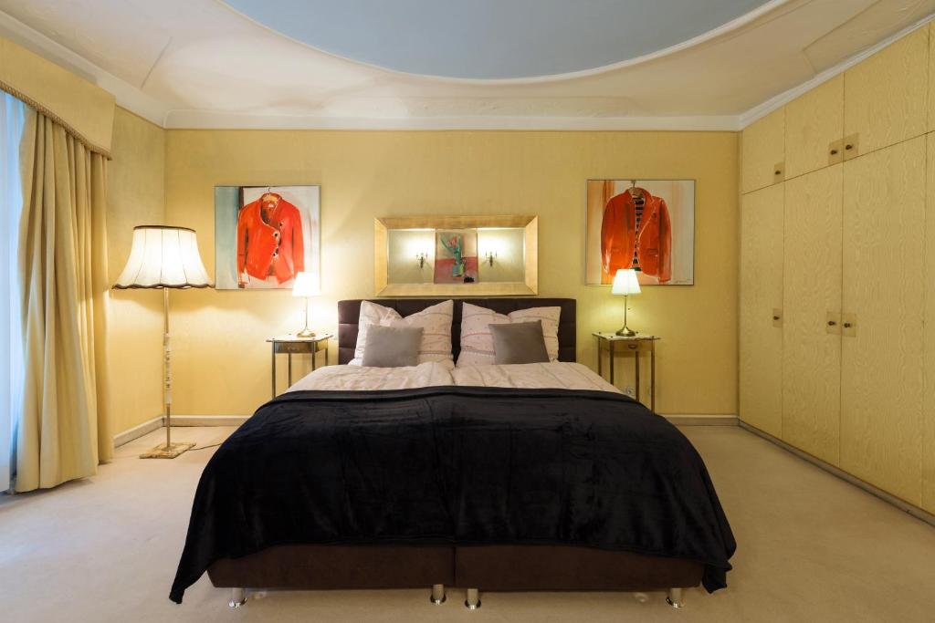 Кровать или кровати в номере Apartment Sonnenfelsgasse