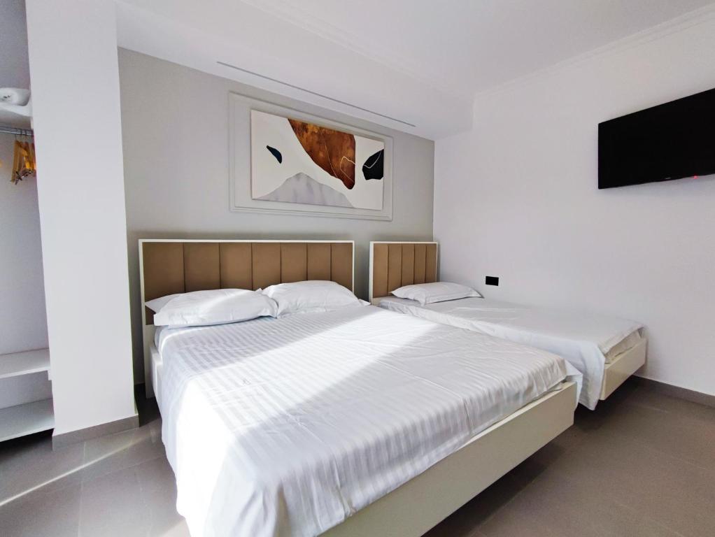 Postel nebo postele na pokoji v ubytování Comfort Villa