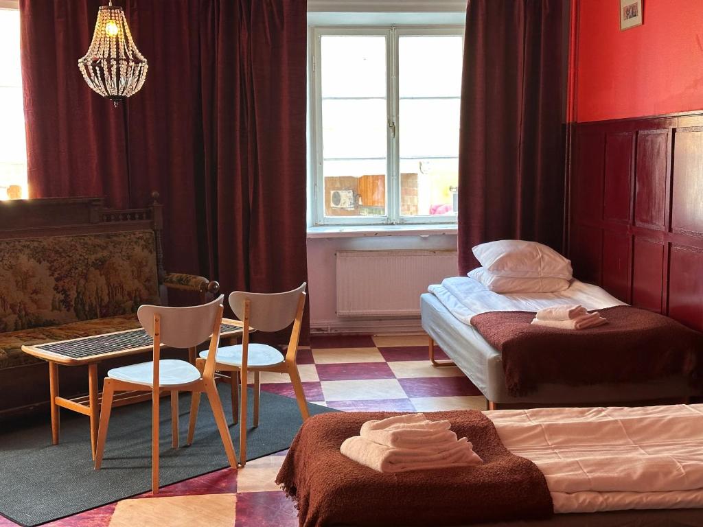 Postel nebo postele na pokoji v ubytování Reimersholme Hotel
