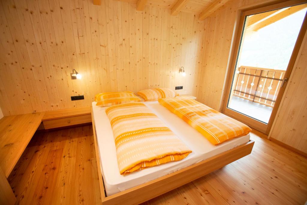Postel nebo postele na pokoji v ubytování Anderleithof