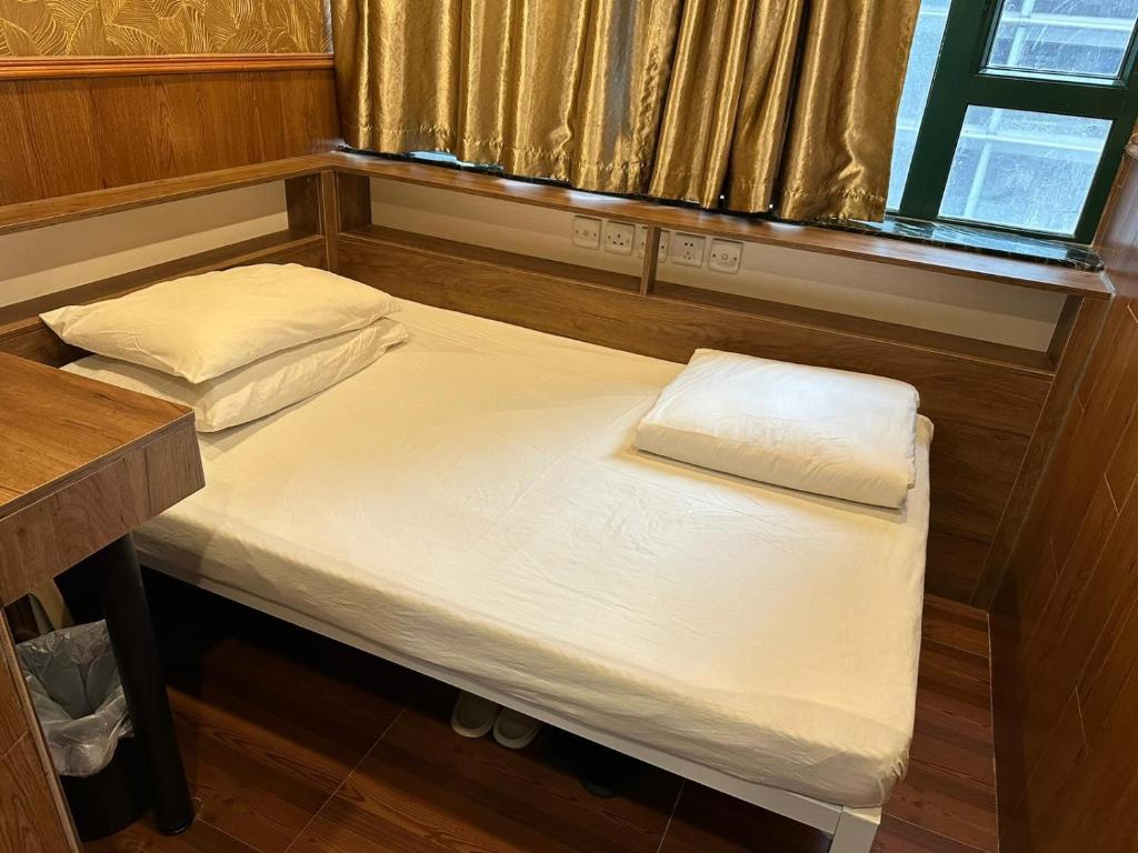 Voodi või voodid majutusasutuse HK Peaceful Guesthouse toas