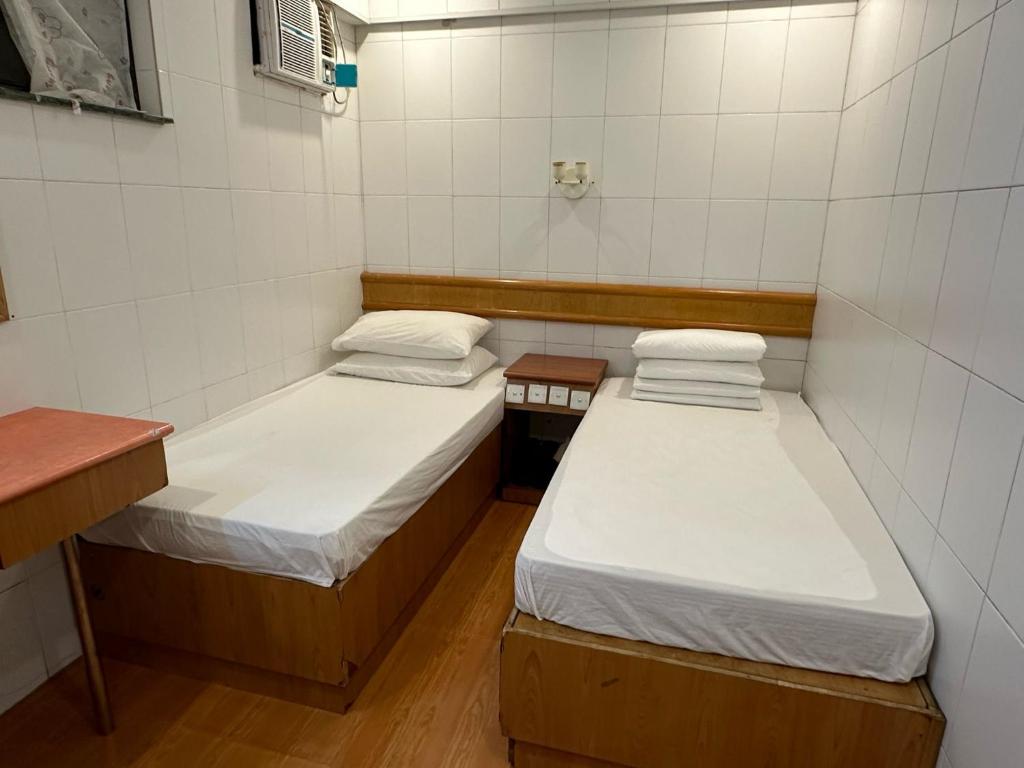 Voodi või voodid majutusasutuse HK Peaceful Guesthouse toas