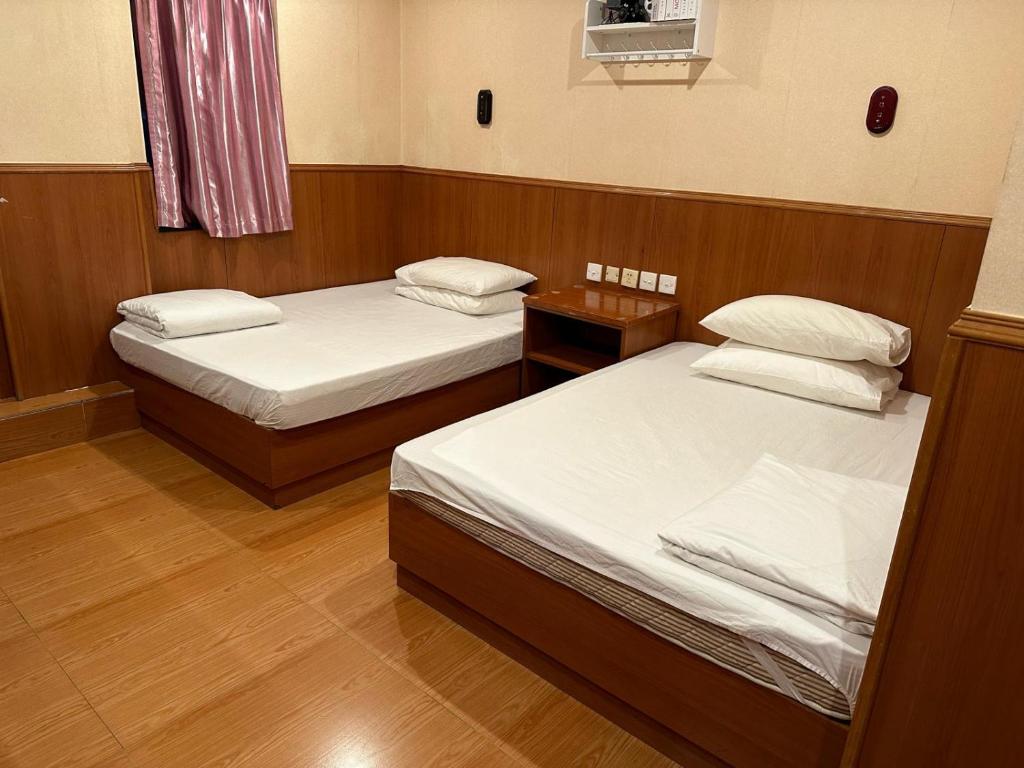 Voodi või voodid majutusasutuse HK Peaceful Guesthouse toas