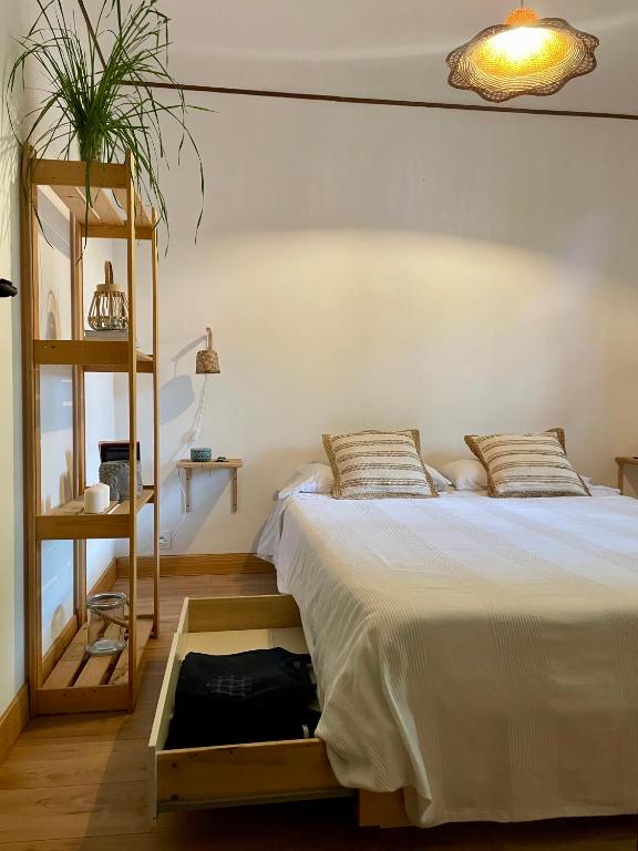 Postel nebo postele na pokoji v ubytování Yacumama Guesthouse