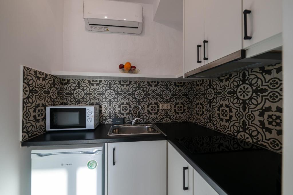 Kuchyň nebo kuchyňský kout v ubytování Abeloessa Methonian Hospitality