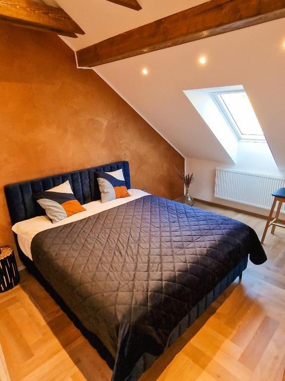 Postel nebo postele na pokoji v ubytování Apartmán Podzámčí