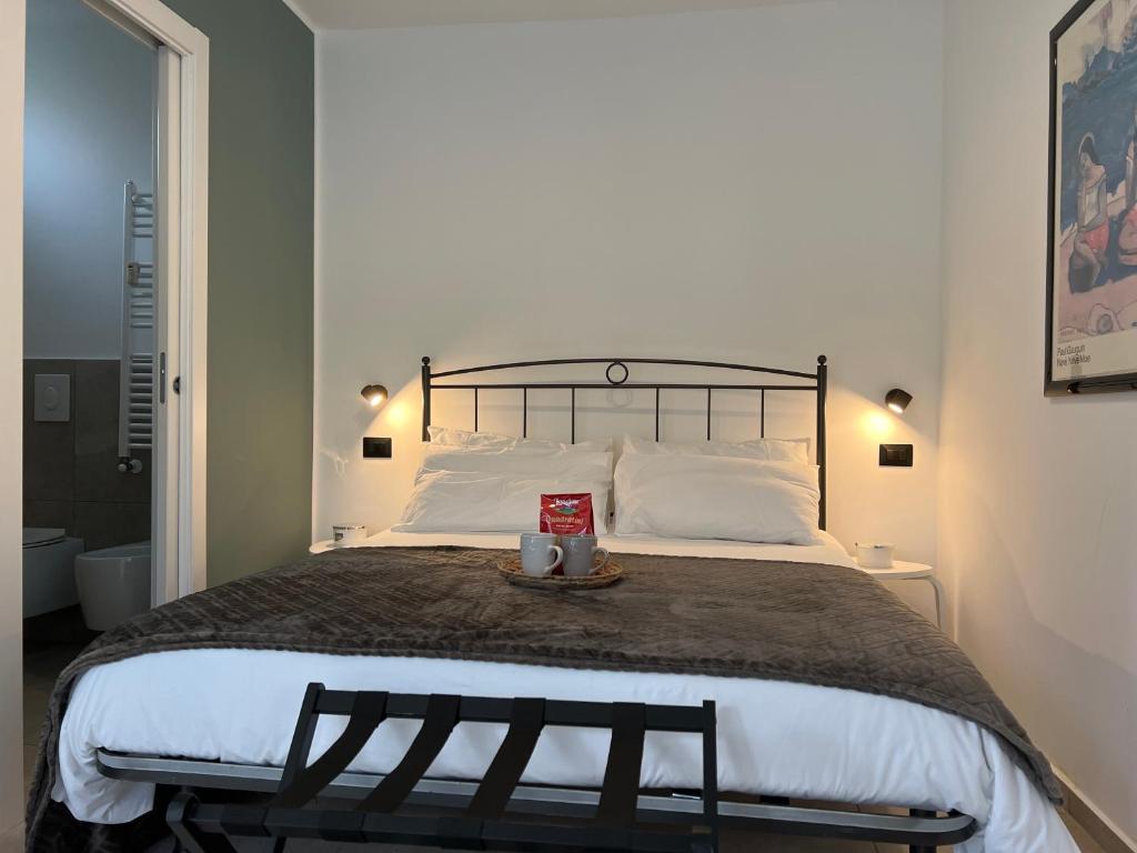 En eller flere senge i et værelse på Ca Rota house free parking