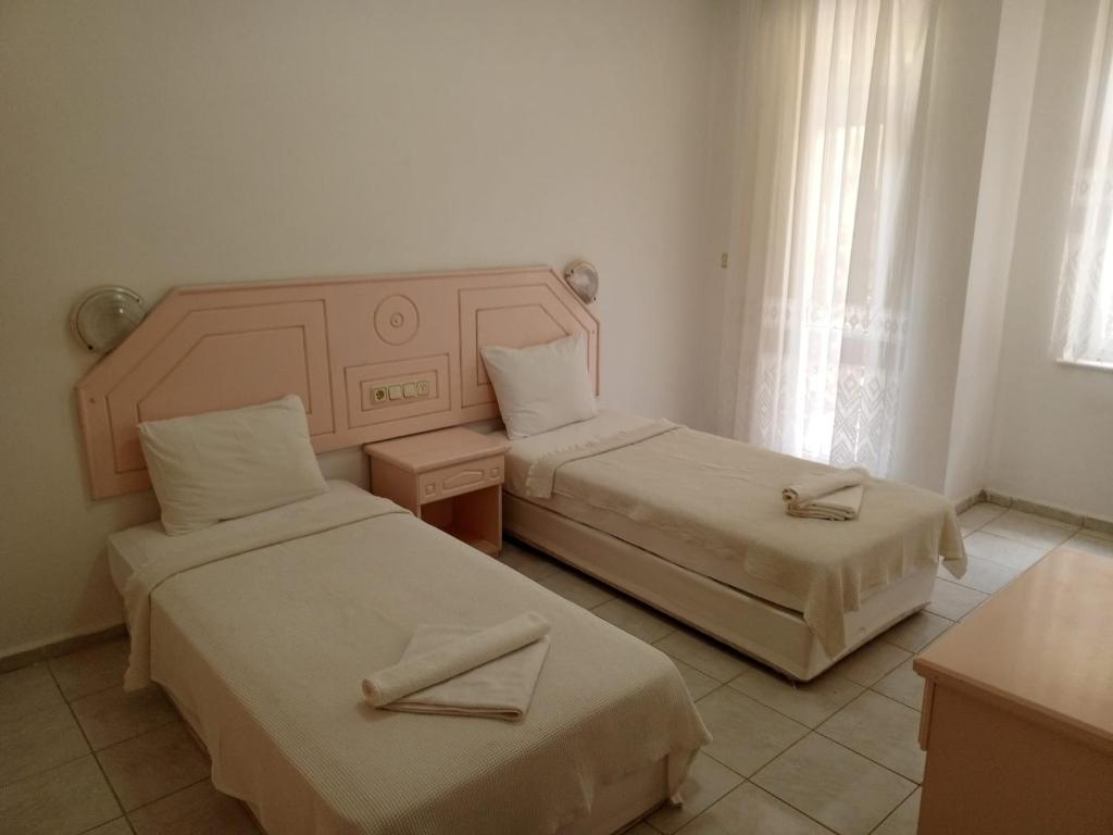 Katil atau katil-katil dalam bilik di PEMBE KÖŞK APART OTEL