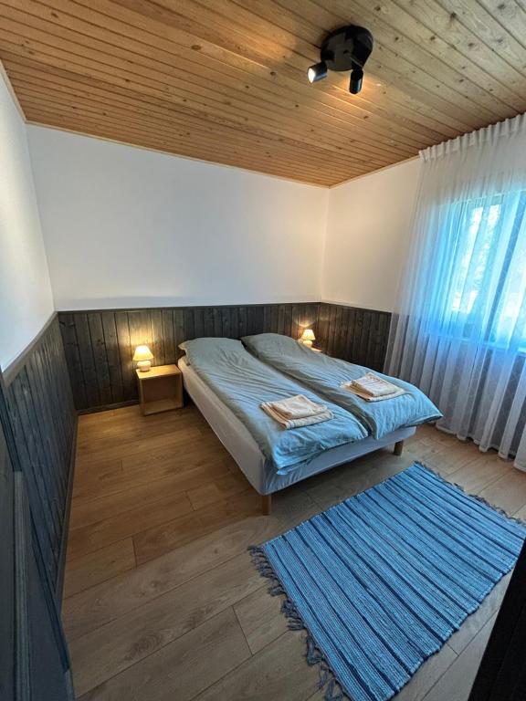 Postel nebo postele na pokoji v ubytování Kämping Kängsepp