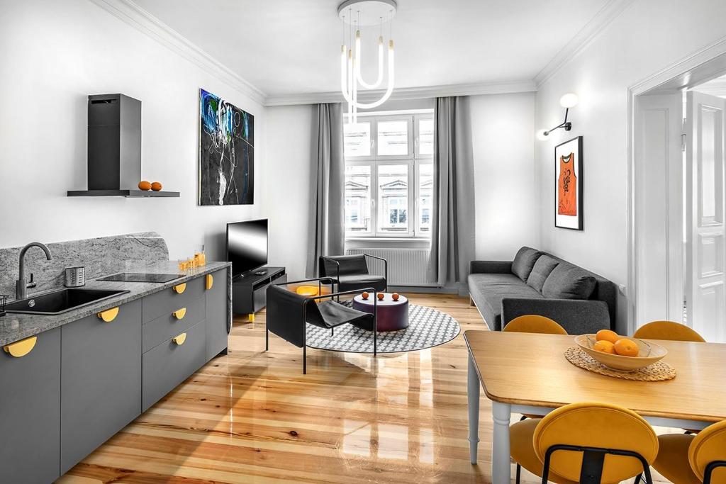 Posedenie v ubytovaní Apartamenty Pomarańczarnia