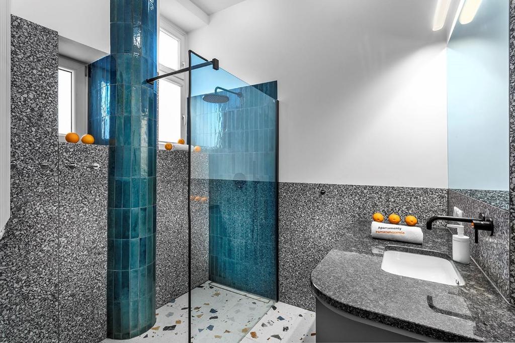 Kúpeľňa v ubytovaní Apartamenty Pomarańczarnia