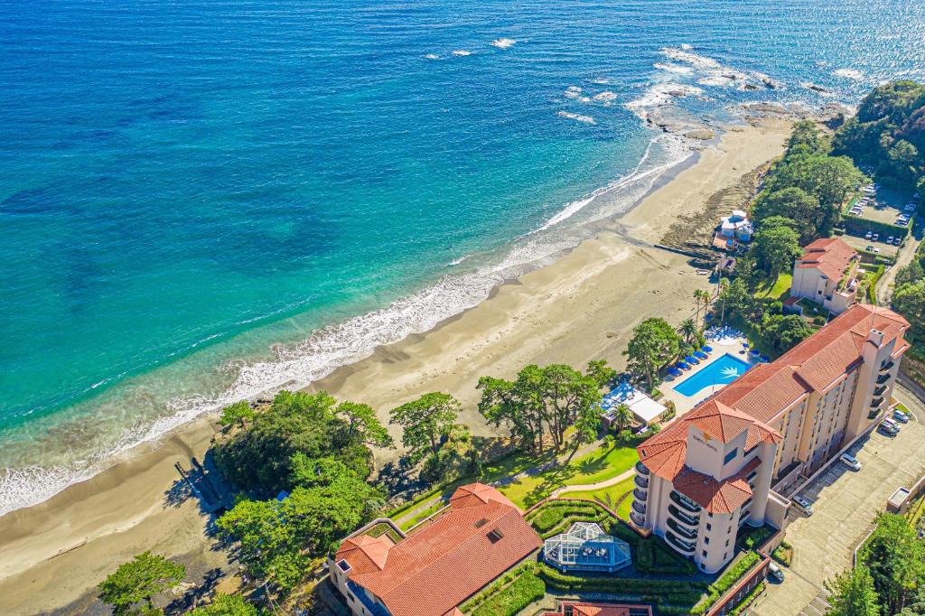 an aerial view of a resort and the beach at Izu Imaihama Tokyu Hotel in Kawazu