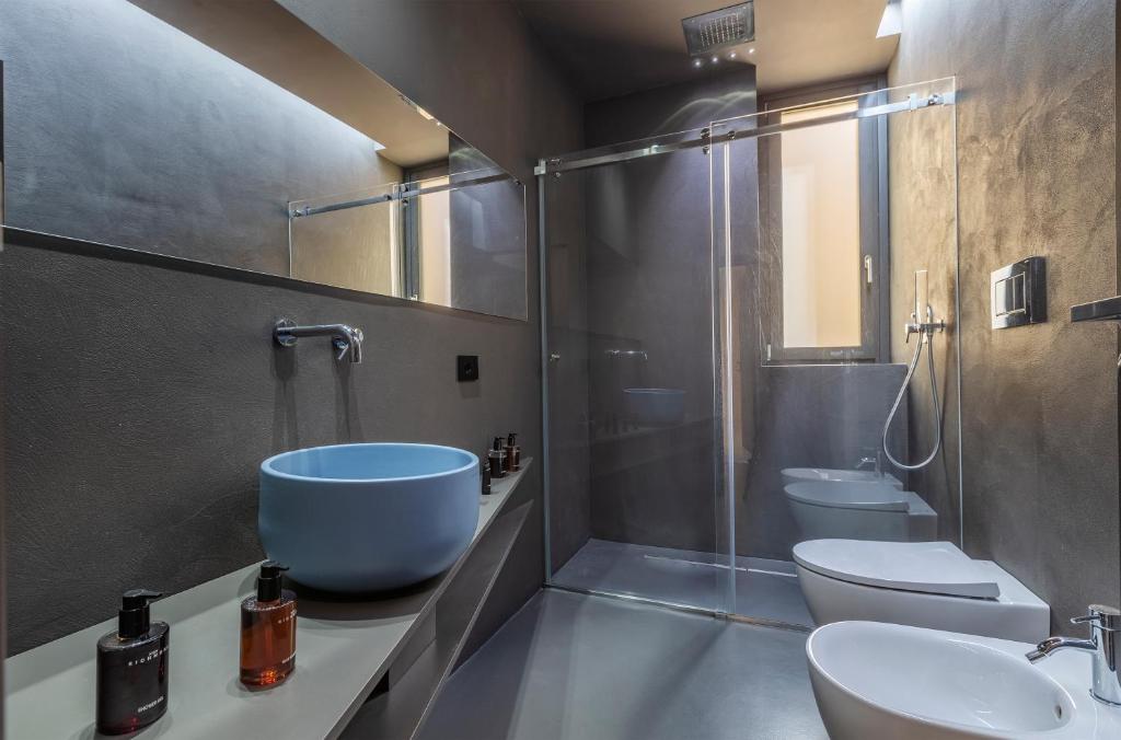 Koupelna v ubytování Fiveplace Design Suites & Apartments