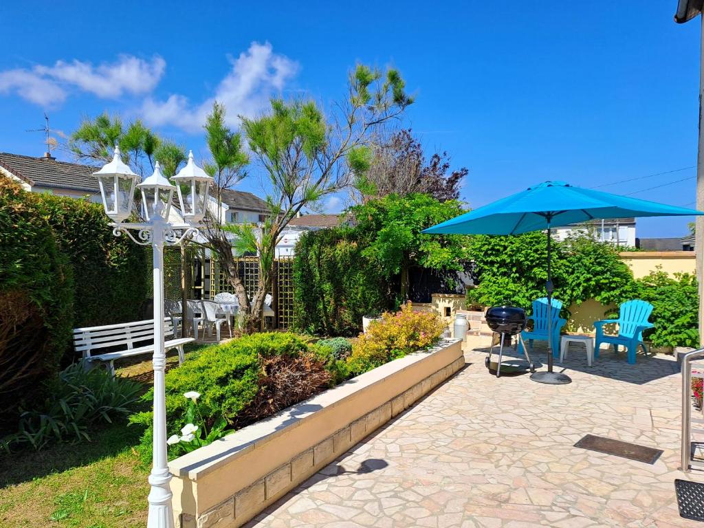 Zahrada ubytování Le Caprice de la mer - maison avec véranda, jardin