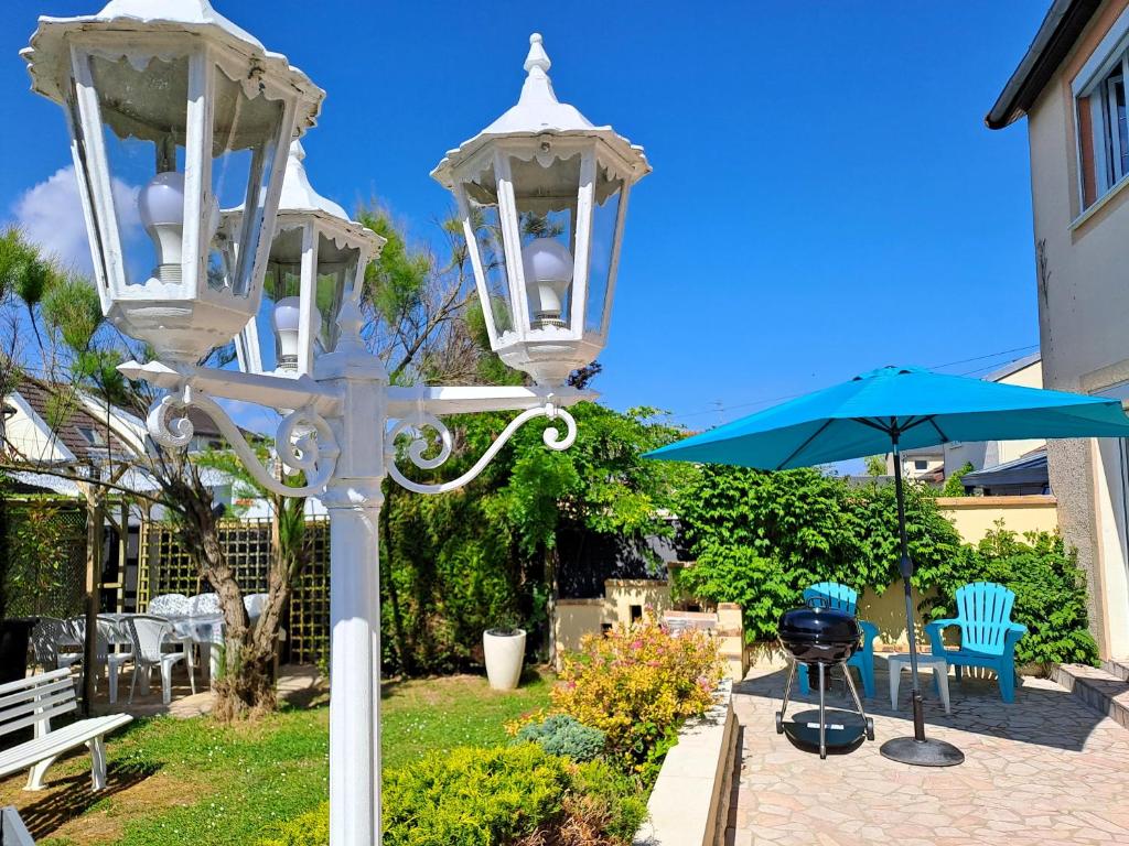 Zahrada ubytování Le Caprice de la mer - maison avec véranda, jardin