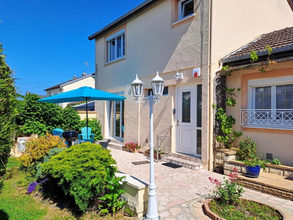 Zahrada ubytování Le Caprice de la mer - maison avec véranda, jardin