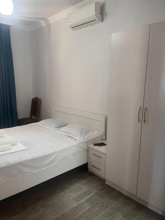 Postel nebo postele na pokoji v ubytování Lia Guest House