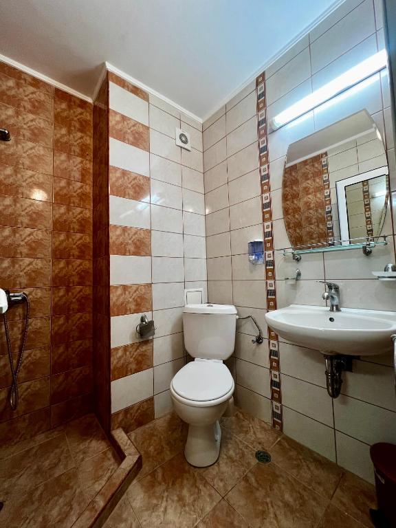 Koupelna v ubytování Adeti Residence