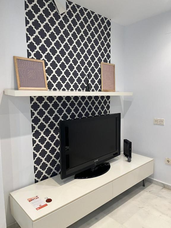TV a/nebo společenská místnost v ubytování La Piccola Cadiz