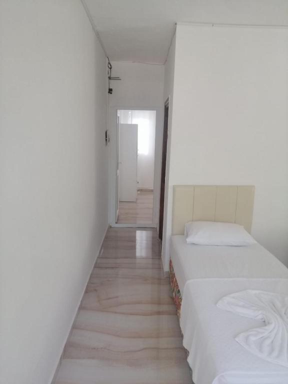 Postel nebo postele na pokoji v ubytování Kiriş Garden Hotel
