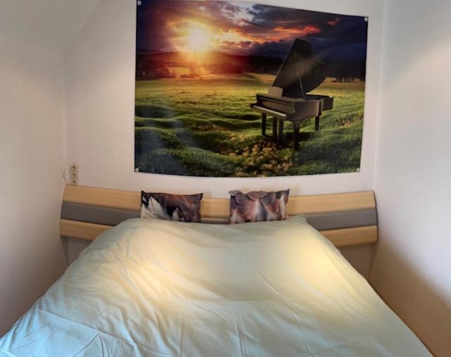 Postel nebo postele na pokoji v ubytování 't Mozarthuys