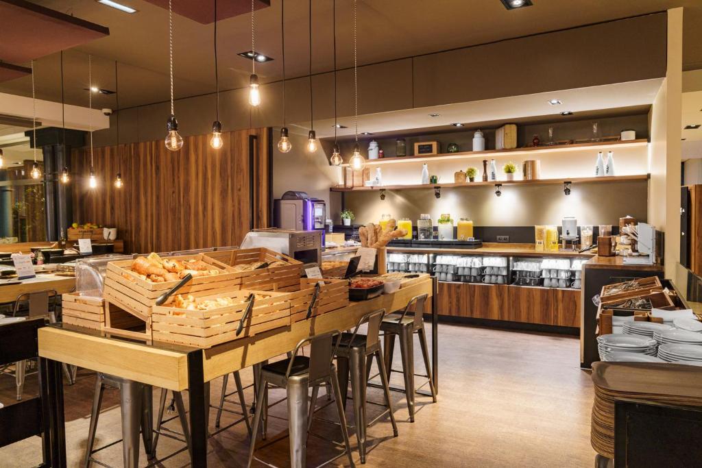 Restaurant ou autre lieu de restauration dans l'établissement L'Elysée Val d'Europe