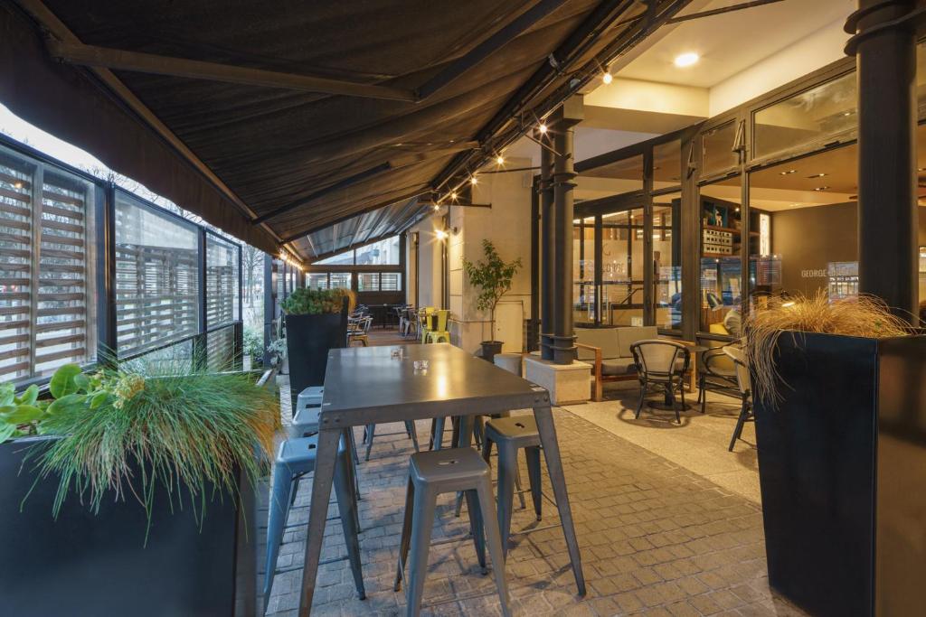 Restaurant ou autre lieu de restauration dans l'établissement L'Elysée Val d'Europe