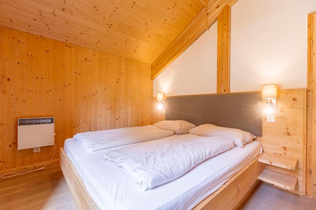Posteľ alebo postele v izbe v ubytovaní Alpenchalets Reiteralm by ALPS RESORTS