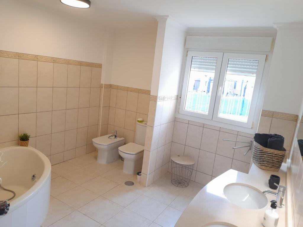 Koupelna v ubytování Beautiful apartment Enjoy, with a shared pool