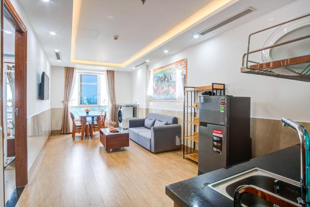 Kuchyň nebo kuchyňský kout v ubytování Phan Van 2 hotel