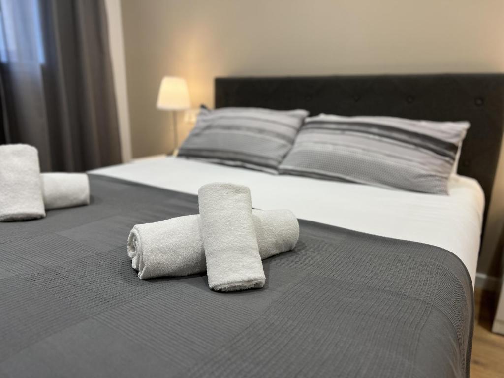 Postel nebo postele na pokoji v ubytování Apartamenticos Plaza Las Armas III