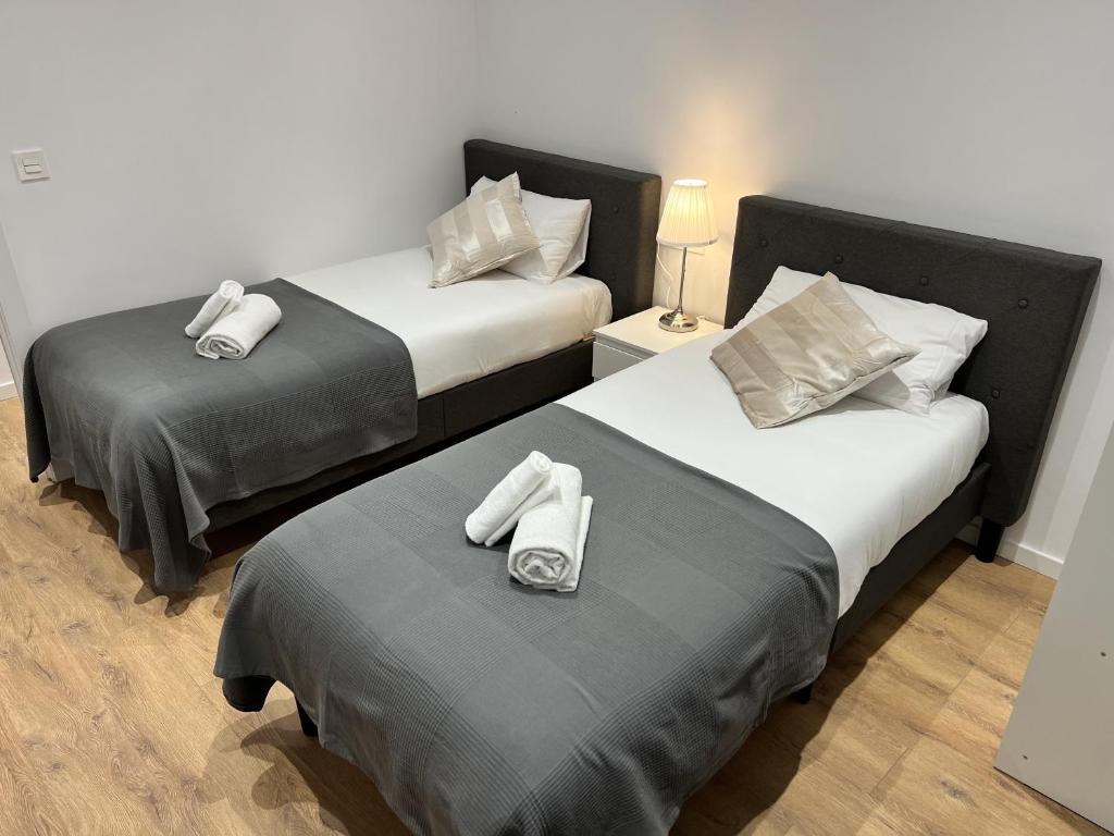 Postel nebo postele na pokoji v ubytování Apartamenticos Plaza Las Armas III